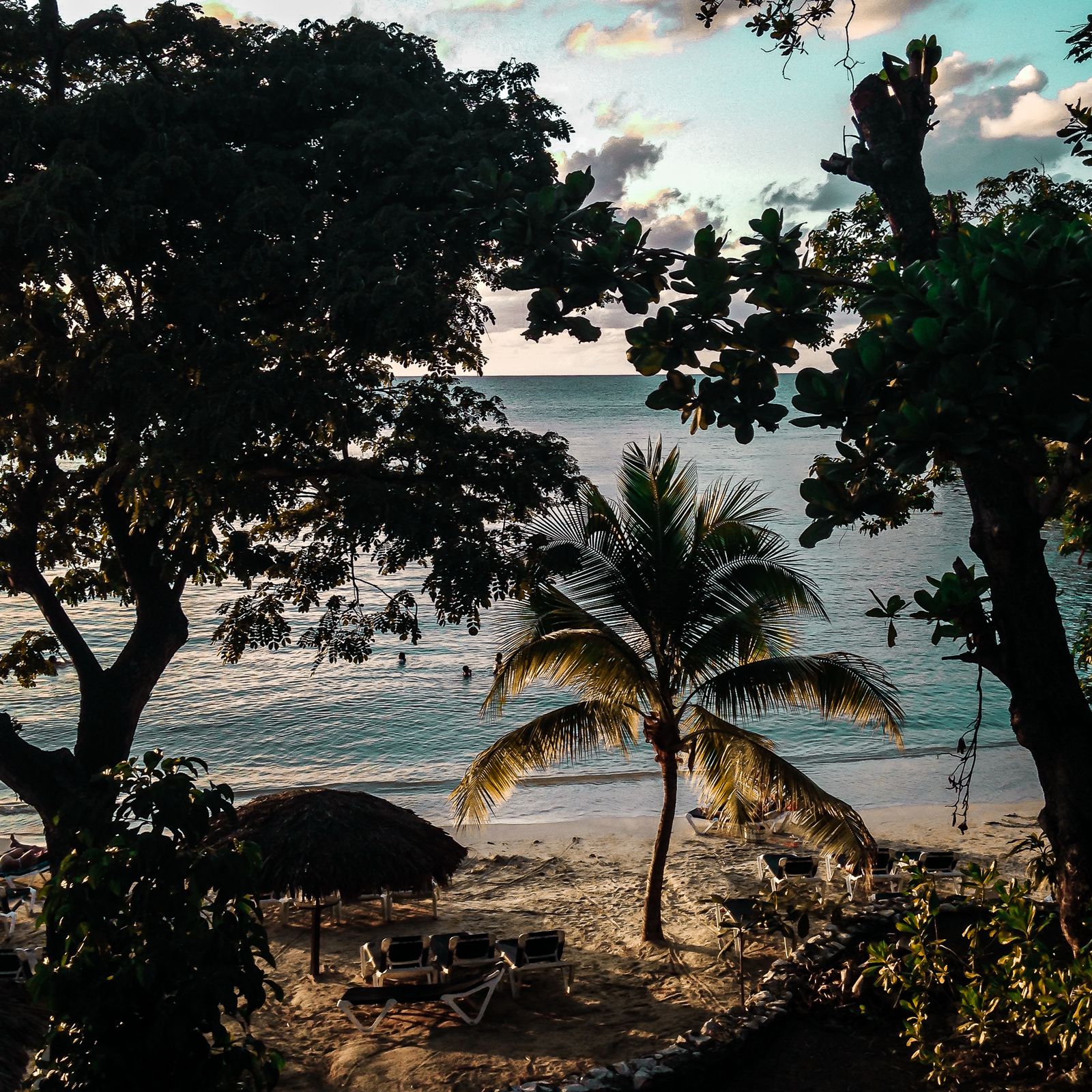A quiet Jamaican beach as the evening light goes soft